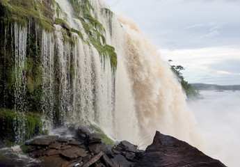 The profile view of the Hacha waterfall in the lagoon of Canaima national park after - Venezuela, Latin America