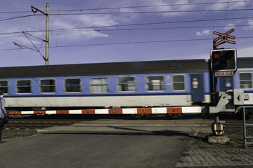 Railroad crossing with gates and road