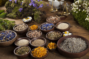Herbal medicine on wooden desk background