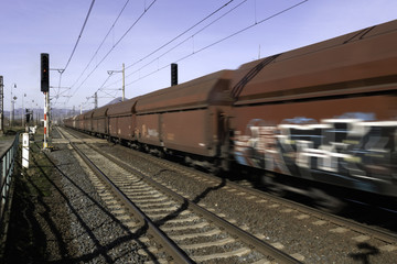 Railroad crossing with gates and road