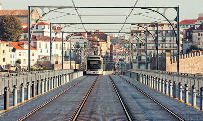 Porto tram on the Dom Luís I Bridge, classical view