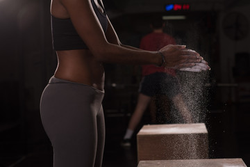 black woman preparing for climbing workout