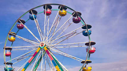 Colorful Ferris Wheel at a Fair on a Summer Day