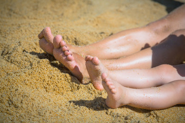 Female feet sunbathing