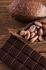 Chocolate bar, candy sweet, dessert food on wooden background