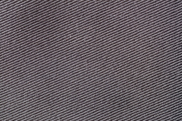 Fabric texture, diagonal pattern, dark color. For background , backdrop, substrate, composition...