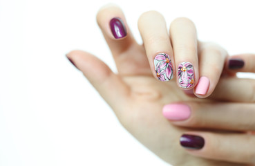 Nail design . Manicure nail paint . beautiful female hand with colorful nail art design manicure