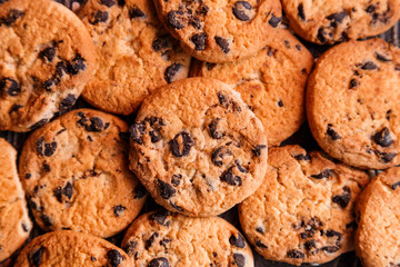 Lots of delicious homemade chocolate chip cookies. View from above, close up