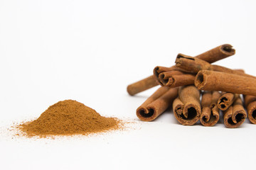 Cinnamon stick isolated on white background,minced fresh cinnamon.