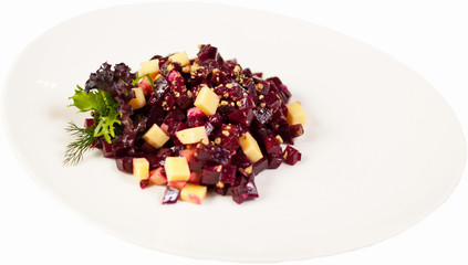 salad vinaigrette on a plate on a white background isolated close up.