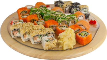 assorted sushi and rolls on a wooden Board