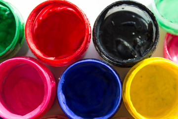 jars with gouache paint