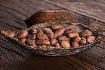 Cocoa pod on wooden table
