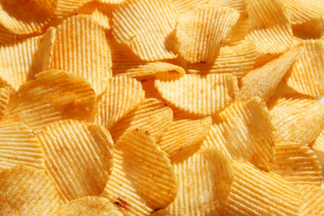 background corrugated golden chips with texture