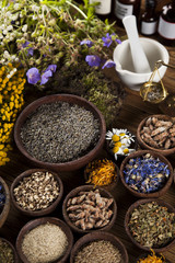 Natural medicine on wooden table background