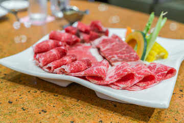 Uncooked raw fresh beef .