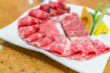Uncooked raw fresh beef .