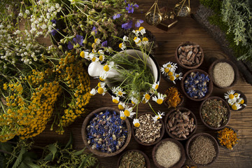 Herbal medicine on wooden desk background