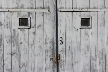Light blue painted wooden door