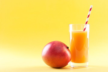 mango juice isolated on a yellow background