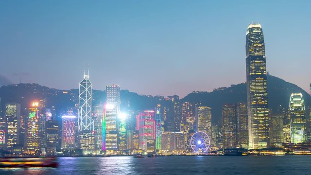 sunset twilight sky hong kong city famous tower wheel panorama 4k time lapse china
