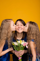 Daughters Wish mom a happy holiday bouquet of flowers