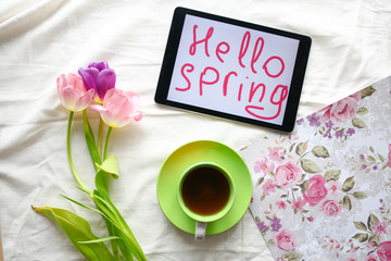 sweets,tablet and tulips.  Women's day, Mother's Day.