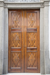 Wooden old carved door.