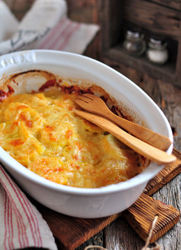 Delicious potato casserole with cheese and cream.