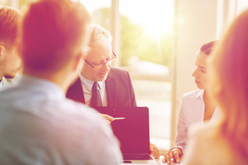 business people with laptop meeting in office