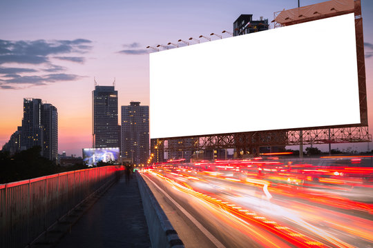 blank billboard on light trails, street, city and urban in the evening or twilight