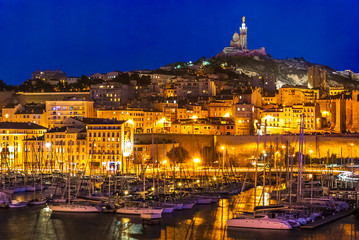 Fototapeta na wymiar The harbor of Marseille at night