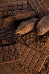 Chocolate sweet, cocoa pod and food dessert background