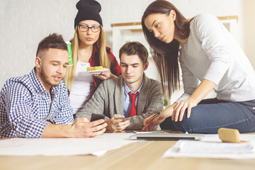 Fototapeta premium People checking smartphones