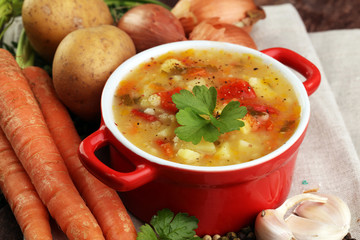 Barley and vegetable thick healthy soup. Krupnik thick Polish soup made from vegetable or broth, containing potatoes and barley groats