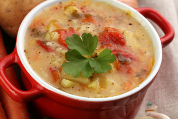 Barley and vegetable thick healthy soup. Krupnik thick Polish soup made from vegetable or broth, containing potatoes and barley groats
