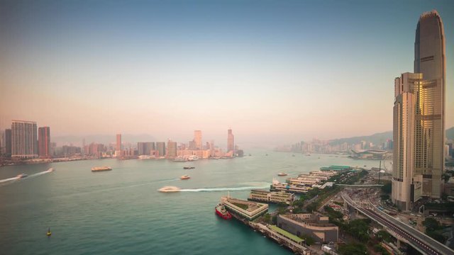 sunset light hong kong city bay victoria harbour rooftop panorama 4k time lapse china
