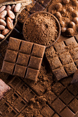 Dark and milk chocolate bar on a wooden table