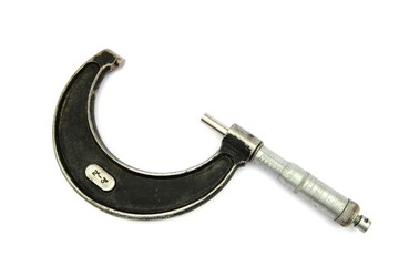 Vintage imperial measurement micrometer, two inch to three inch, on white background