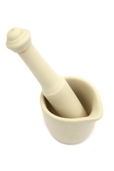Traditional porcelain mortar and pestle, used to grind spices, on white background