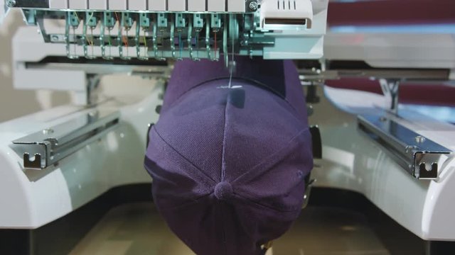 Embroidery machine deals logo on the cap dolly shoot