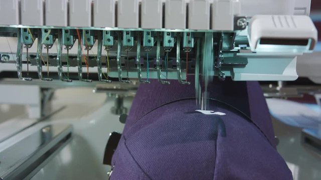 Embroidery machine deals logo on the cap dolly shoot