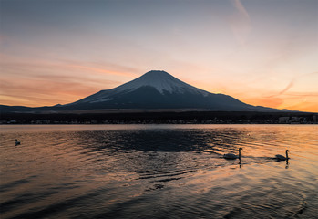 View of Mount Fuji and Lake Yamanakako in winter evening. Lake Yamanakako is the largest of the Fuji Five Lakes.