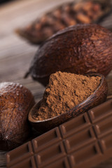 Cocoa pod and chocolate bar and food dessert background