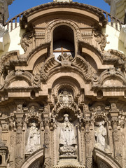 Lima. Peru. Stonework adorning facade of Monastery of San Francisco consecrated in 1673