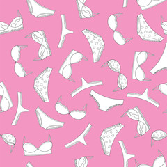 Lingerie seamless pattern with pink hearts. Vector underwear background
