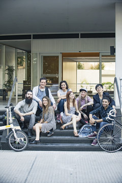 Group of friends sitting on steps