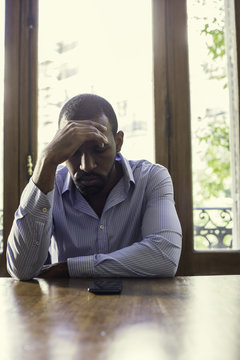 Man impatiently waiting for phone call