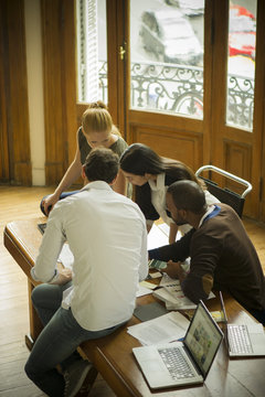 Office workers collaborating