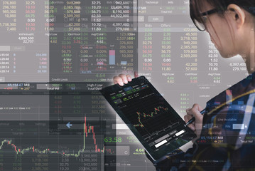 Double exposure of business woman with glasses in hipster shirts holding tablet for check stock market graph, Business Trading concept
